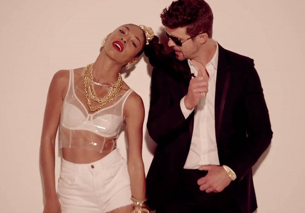 Is she a doll? Is she a schoolgirl willing to do favors? Is she a fetish object? This model is all that and more in Robin Thicke's sexist and hateful video "Blurred LInes." (Photo courtesy 