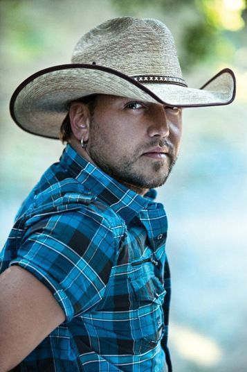 Jason Aldean's song "Night Train" is about an urgent escape to a transcendent place. The other country songs in the Top 40 are all pickup songs. (Photo courtesy Broken Bow)