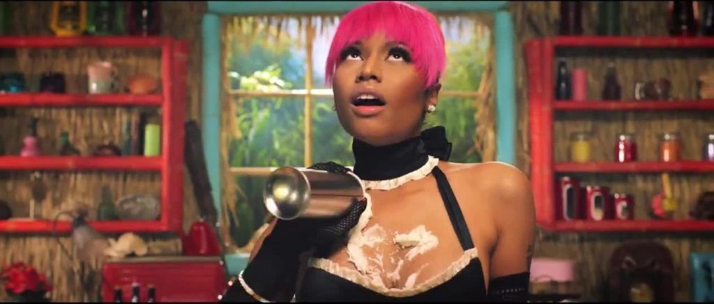 Minaj uses a series of images from pornography to commodify herself as a male fantasy sexual object in the "Anaconda" music video. (Photo courtesy Universal)